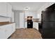 A kitchen showcasing white cabinets, modern appliances, and neutral countertops at 3929 Emerald Springs Ct, Decatur, GA 30035