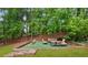 Relaxing outdoor space with comfortable seating and a cozy hammock at 1008 Stream Valley Ct, Alpharetta, GA 30022