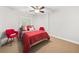 Cozy bedroom with ample natural light and comfortable furnishings at 1008 Stream Valley Ct, Alpharetta, GA 30022