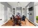 Bright home office with built-in bookshelves, hardwood floors, and large windows at 1008 Stream Valley Ct, Alpharetta, GA 30022