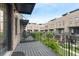 Balcony with black railings overlooking complex courtyard and lush landscaping at 1032 Robert Smalls Way, Atlanta, GA 30318