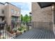 Private balcony showcases views of a beautifully landscaped community courtyard at 1032 Robert Smalls Way, Atlanta, GA 30318