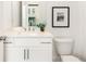 Modern bathroom with white vanity, quartz countertop, and neutral decor at 1032 Robert Smalls Way, Atlanta, GA 30318