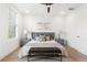 Inviting bedroom with ceiling fan, neutral tones, and modern decor at 1032 Robert Smalls Way, Atlanta, GA 30318