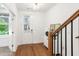 Bright entryway boasting hardwood floors, modern decor, and an inviting atmosphere at 1032 Robert Smalls Way, Atlanta, GA 30318