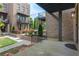 Charming exterior with manicured landscaping, brick facade, and inviting outdoor space at 1032 Robert Smalls Way, Atlanta, GA 30318