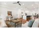 Open-concept layout with a seamless transition from the living room to the modern kitchen and dining area at 1032 Robert Smalls Way, Atlanta, GA 30318