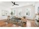 Cozy living room with hardwood floors, modern furnishings, and ample natural light at 1032 Robert Smalls Way, Atlanta, GA 30318
