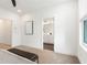 Spacious bedroom with ensuite bath, neutral decor, plush carpet, and large windows at 1032 Robert Smalls Way, Atlanta, GA 30318