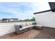 Spacious rooftop deck featuring a comfortable sectional sofa, ideal for outdoor relaxation and city views at 1032 Robert Smalls Way, Atlanta, GA 30318