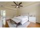Bright main bedroom with hardwood floors and plenty of natural light at 10610 Kingsmark Trl, Alpharetta, GA 30022