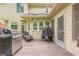 Enjoy an outdoor deck with built-in grill and comfortable seating at 10610 Kingsmark Trl, Alpharetta, GA 30022