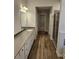 Neutral bathroom with double sinks, tile flooring, walk in shower, and lots of cabinet space at 221 Eleanora Way, Loganville, GA 30052