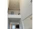 Spacious interior with high ceilings and a railing view from the open upper floor at 221 Eleanora Way, Loganville, GA 30052
