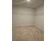 Empty walk-in closet featuring built-in shelving and carpet flooring at 221 Eleanora Way, Loganville, GA 30052