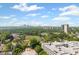 Scenic aerial view of the cityscape, greenery, and building at 250 Pharr Ne Rd # 1914, Atlanta, GA 30305
