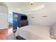 Well-lit bedroom with hardwood floors and view to adjoining living area at 250 Pharr Ne Rd # 1914, Atlanta, GA 30305