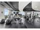 Modern gym with state-of-the-art cardio equipment and expansive windows offering scenic views at 250 Pharr Ne Rd # 1914, Atlanta, GA 30305