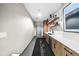 Modern kitchenette with stainless steel appliances, custom cabinetry, and stylish finishes for convenience at 250 Pharr Ne Rd # 1914, Atlanta, GA 30305