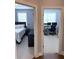 Hallway with doorways to bedroom and office space at 4487 Kerrington Ave, Sugar Hill, GA 30518