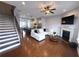 Bright and airy living space with an open floor plan, connecting the kitchen and living room at 4487 Kerrington Ave, Sugar Hill, GA 30518