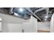 Unfinished basement featuring open ceiling and HVAC ductwork at 4536 Mountain Creek Ne Dr, Roswell, GA 30075
