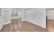 Bright living area with hardwood floors, French doors, and an open layout leading to the dining and Gathering rooms at 4536 Mountain Creek Ne Dr, Roswell, GA 30075