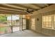 Relaxing screened porch with outdoor lighting, ceiling fan and views of the backyard at 4536 Mountain Creek Ne Dr, Roswell, GA 30075