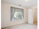 Bedroom boasts a carpeted floor and a window at 538 First St, Lawrenceville, GA 30046