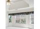 Spacious main bedroom with ceiling fan and plenty of natural light from the large windows at 538 First St, Lawrenceville, GA 30046