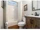 Bathroom featuring a shower-over-tub combination and a modern vanity with storage at 139 Ardsley Run, Canton, GA 30115