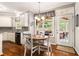 Bright breakfast nook with a view of the outdoor living area at 139 Ardsley Run, Canton, GA 30115