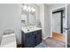 Bathroom with updated vanity, modern sink, and neutral color scheme at 2349 June Springs Sw Dr, Marietta, GA 30008