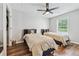 Comfortable bedroom with two twin beds, neutral decor, and ample natural light at 2349 June Springs Sw Dr, Marietta, GA 30008