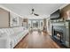 Bright living room with a fireplace, hardwood floors, and many windows at 2349 June Springs Sw Dr, Marietta, GA 30008