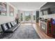 Cozy room with fireplace, black futon and entertainment center at 2349 June Springs Sw Dr, Marietta, GA 30008