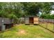 Backyard shed with ample storage space and easy access, nestled in a large green yard at 2349 June Springs Sw Dr, Marietta, GA 30008