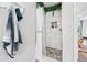 Modern bathroom featuring a tiled shower with a glass door and stylish fixtures at 2349 June Springs Sw Dr, Marietta, GA 30008
