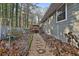 Gravel path along backyard with fence, trees, and vegetation at 337 Andrew Bailey Rd, Sharpsburg, GA 30277