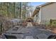 Spacious backyard with mature trees and patio area at 337 Andrew Bailey Rd, Sharpsburg, GA 30277