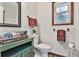 Bathroom featuring a single vanity with wooden floors and a window with natural light at 337 Andrew Bailey Rd, Sharpsburg, GA 30277