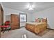 Bedroom with neutral paint, a large window, and comfortable furnishings at 337 Andrew Bailey Rd, Sharpsburg, GA 30277