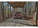 Spacious metal carport offers convenient parking and protection from the elements at 337 Andrew Bailey Rd, Sharpsburg, GA 30277