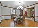 Dining room featuring hardwood floors and a large window with natural light at 337 Andrew Bailey Rd, Sharpsburg, GA 30277