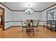 Inviting dining room featuring wooden floors and chandelier at 337 Andrew Bailey Rd, Sharpsburg, GA 30277
