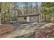 A detached one-car garage with a parking area at 337 Andrew Bailey Rd, Sharpsburg, GA 30277