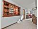 Cozy living room features custom wood built-ins and neutral carpet at 337 Andrew Bailey Rd, Sharpsburg, GA 30277