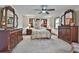 Main bedroom with a well decorated bed, built-in bookshelves, and windows at 337 Andrew Bailey Rd, Sharpsburg, GA 30277