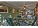 Relaxing covered patio featuring a ceiling fan and outdoor dining area at 337 Andrew Bailey Rd, Sharpsburg, GA 30277