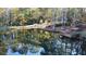 A waterfront view with a wood dock overlooking the water at 337 Andrew Bailey Rd, Sharpsburg, GA 30277